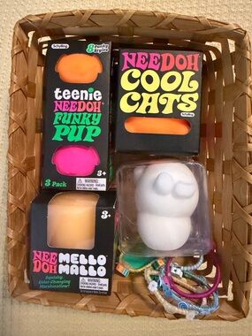 Basket of Needoh Cool Cats & Teenie Funky Pup Squishy Set & hair ties